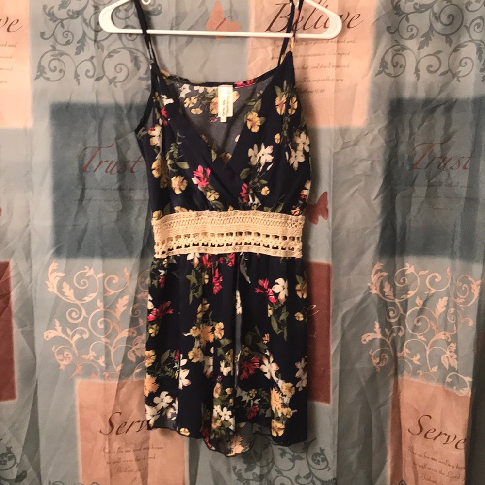 Silk floral romper with flowy shorts area
